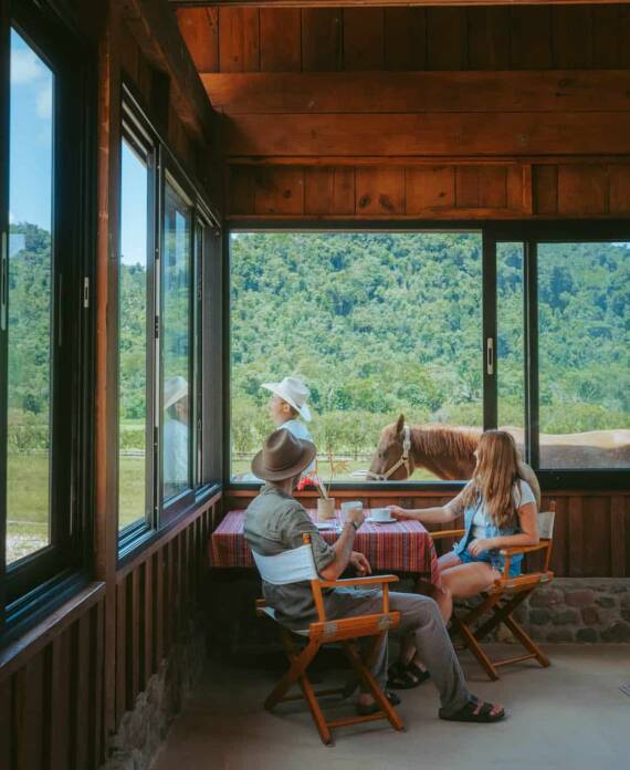 A couple having dinner in the seating area at The Stables at Sleeping Giant.